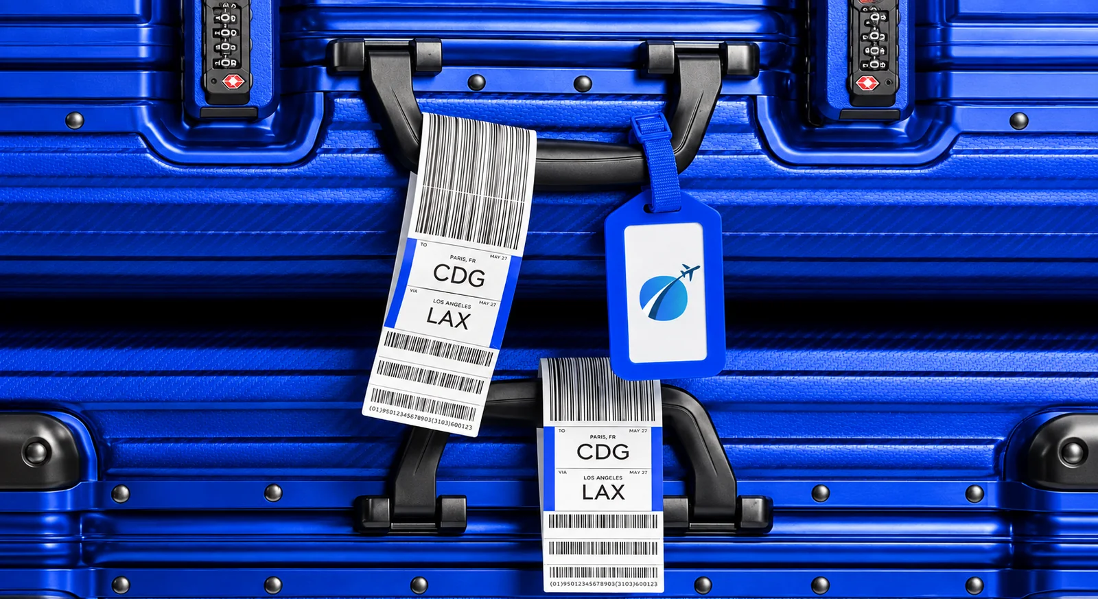 Tucano luggage tags on a blue suitcase, printed for a Paris to Los Angeles flight.